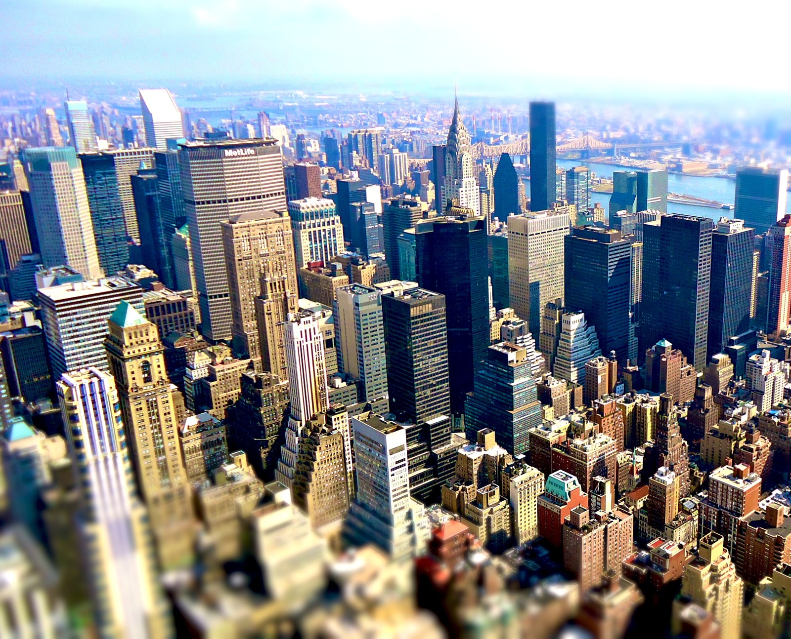 Arafficial view of a city with tall buildings and a river (city, new york)