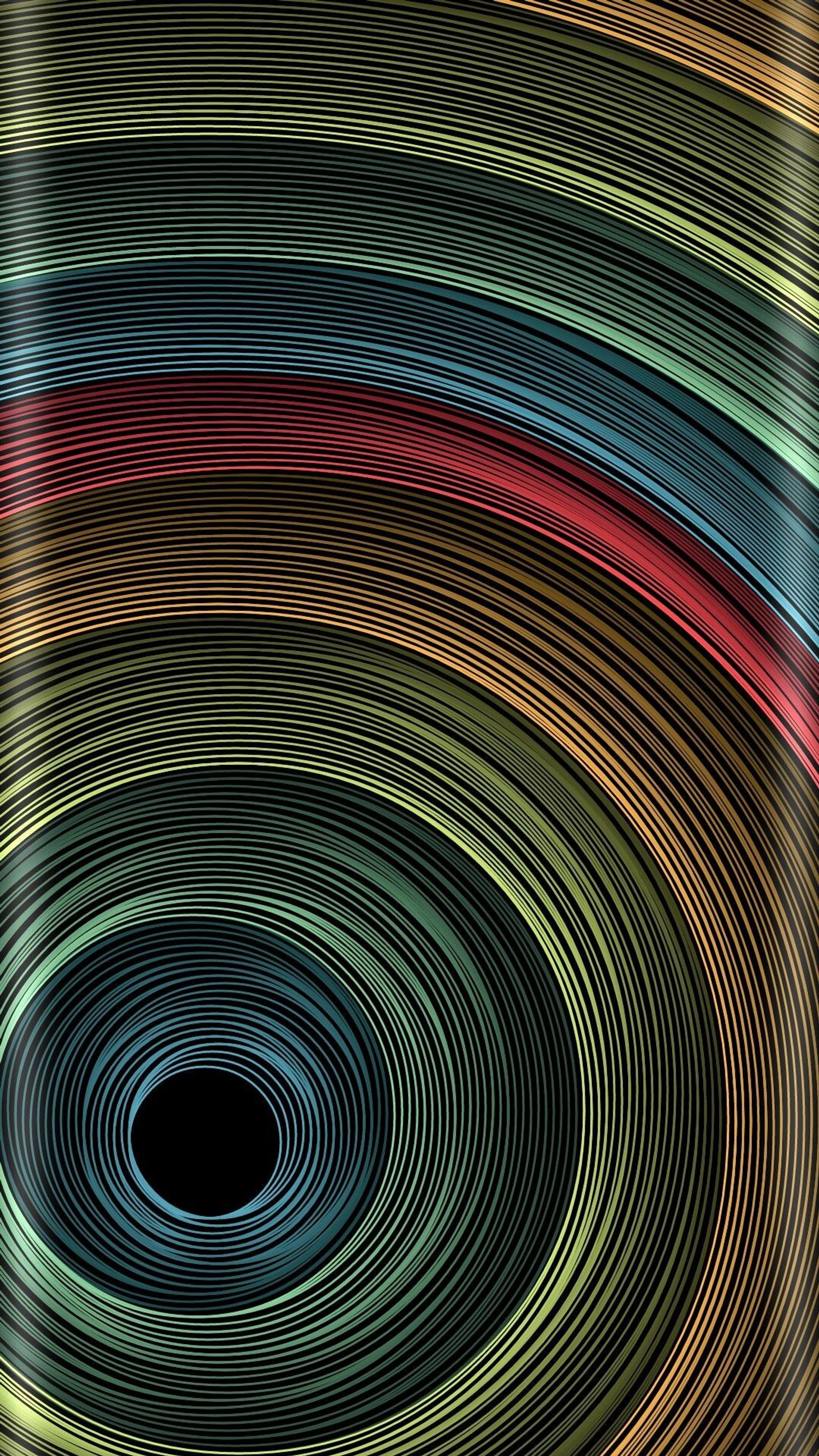 Um close de um design espiral colorido em um celular (fundo, beleza, círculos, colorido, borda)