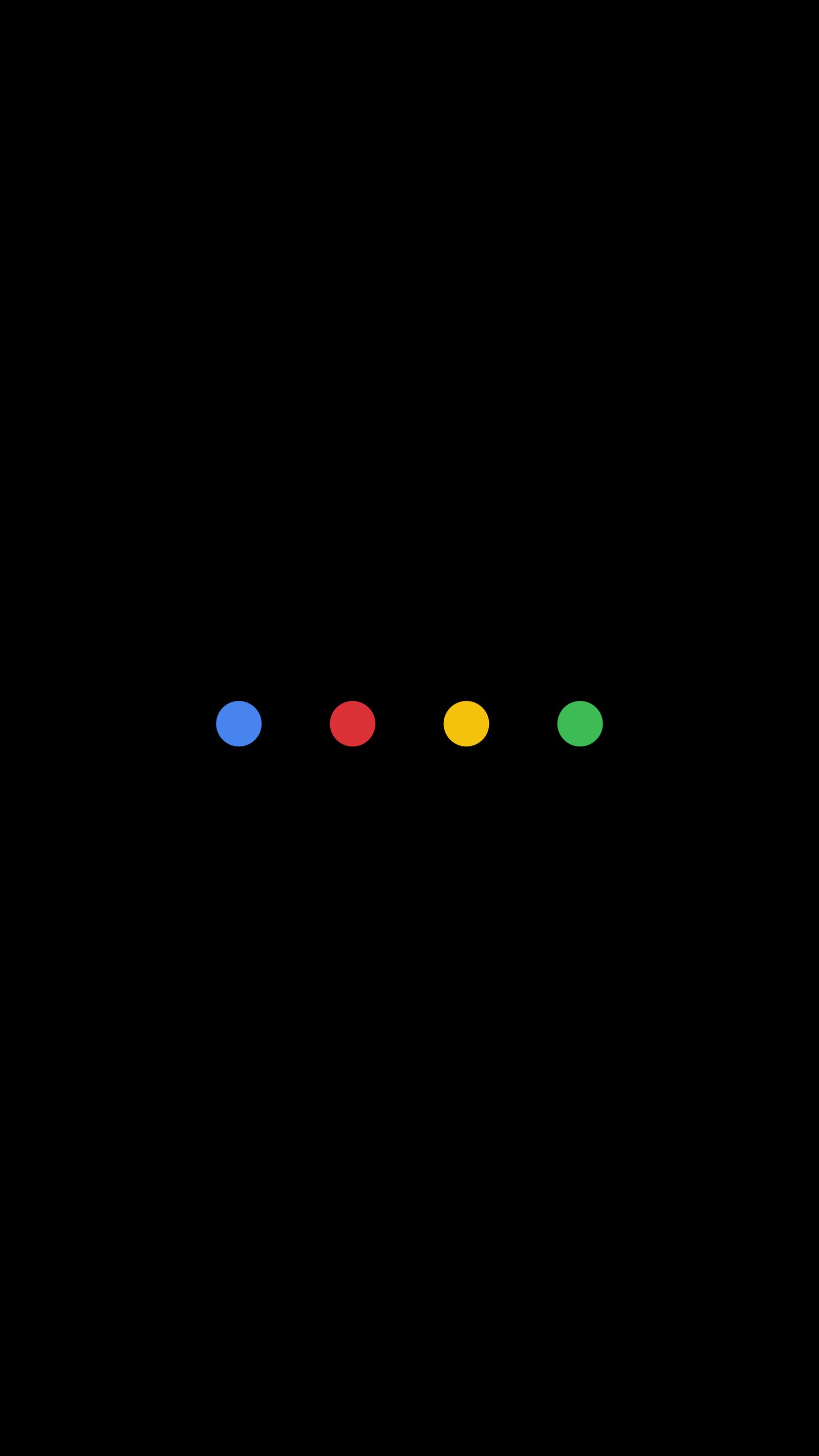 Há quatro círculos de cores diferentes em um fundo preto (amoled, google)