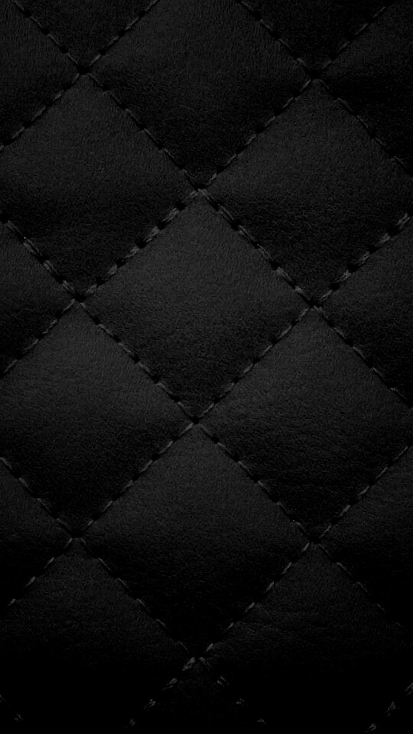 Black leather texture background with a diamond pattern (black, cloth, diamond, leather, patch)