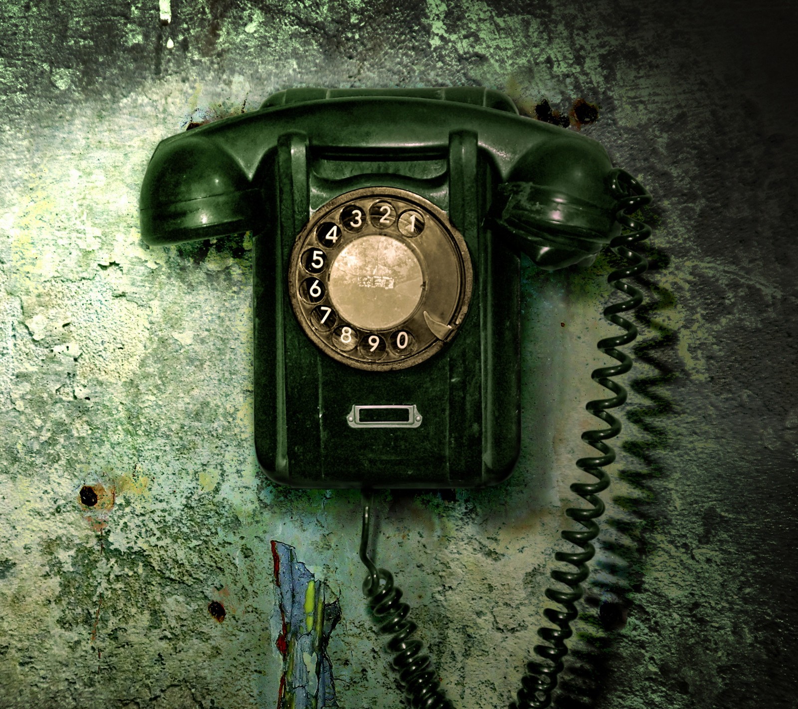 There is a green telephone on a wall with a cord (4k, analogue, communication, dialer, hd)