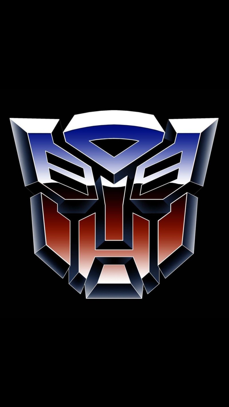 Близкий план логотипа автомобиля на черном фоне (автоботы, autobots, трансформеры, transformers, г1)