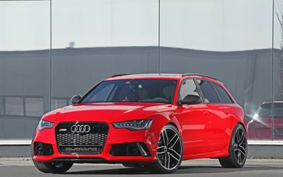 Audi RS 6 Quattro: Un llamativo coche familiar rojo con un potente motor V8 biturbo y un audaz diseño automotriz.