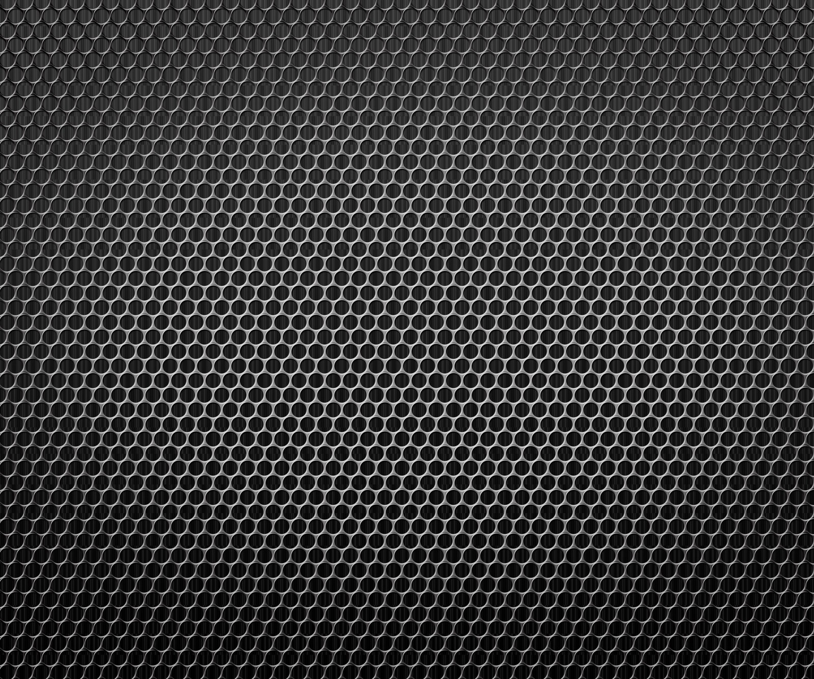 A black metal background with hexagonal mesh pattern (drtu, dtyudty, et5y, ftyu, ty)