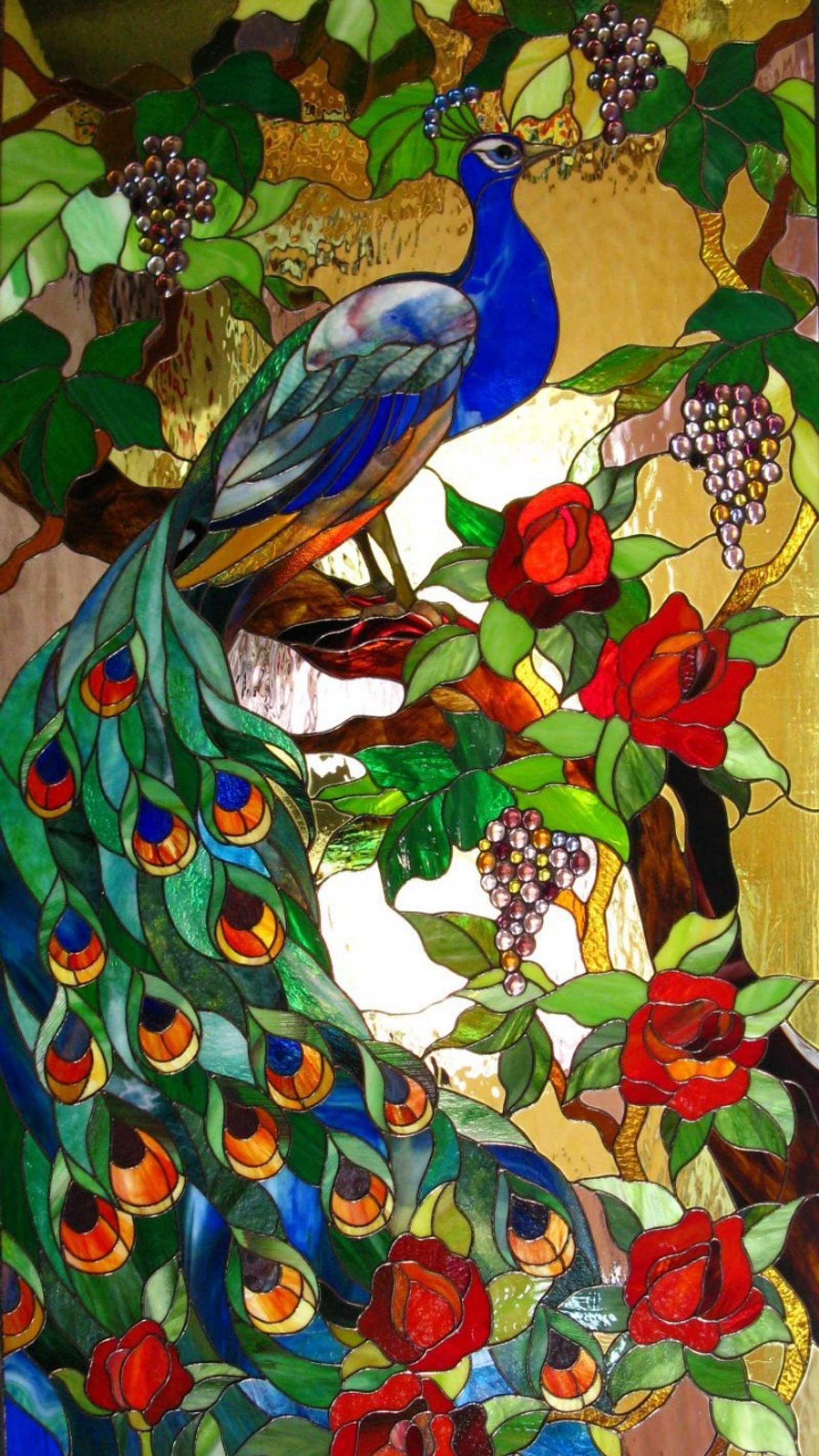 A close up of a stained glass window with a peacock on it (flowers, peacock, stained glass)