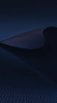 Electric Blue Dune Landscape Under a Starry Night Sky