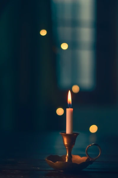 Elegant Candlelight Amidst Soft Darkness