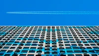 Modern Skyscraper Against a Clear Blue Sky