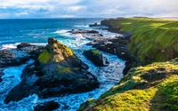 Vibrant Coastal Promontory with Rugged Cliffs and Turquoise Sea