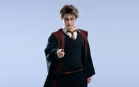 Harry Potter en tenue formelle avec une baguette