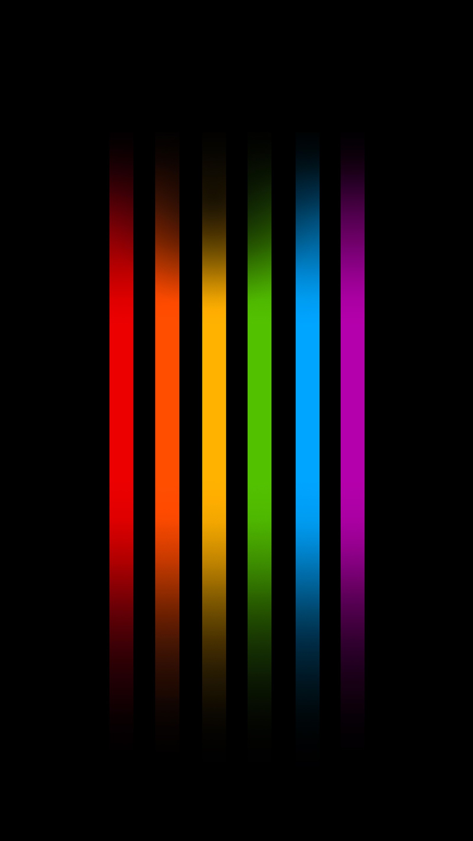 A close up of a black background with a rainbow of colors (colors, pride, respect)