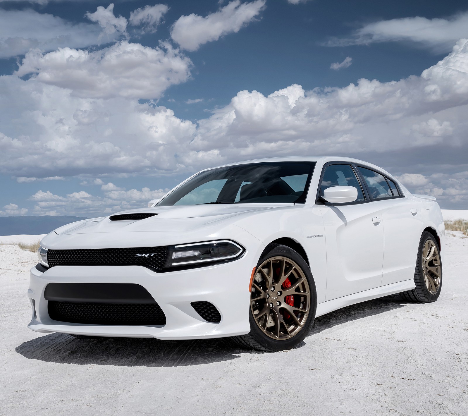 A white dodge charger parked in the desert with a cloudy sky (auto, car, charger, dodge, hellcat)