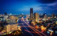 Vibrant Night Cityscape of Dubai with Illuminated Skyscrapers and Reflective Waterways