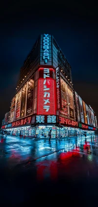 Neon-Illuminated Skyscraper with Reflective Facade in Tokyo