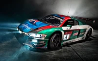 Carro de corrida Audi R8 LMS dinâmico com pintura vibrante em um ambiente de alto desempenho