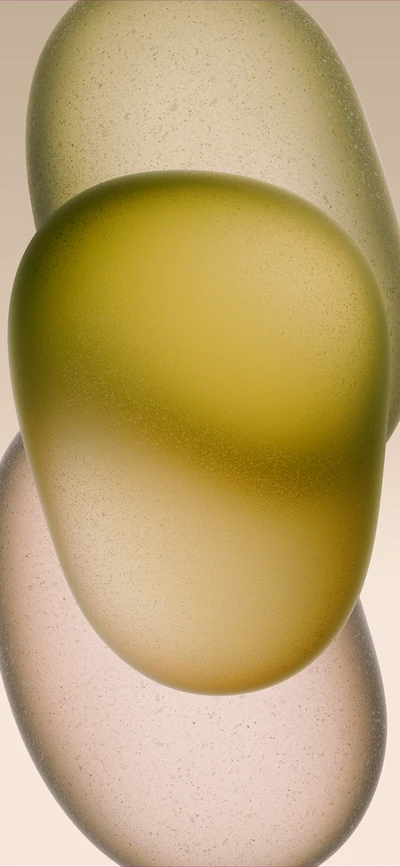 Abstract glass shapes with soft gradients resembling organic forms.