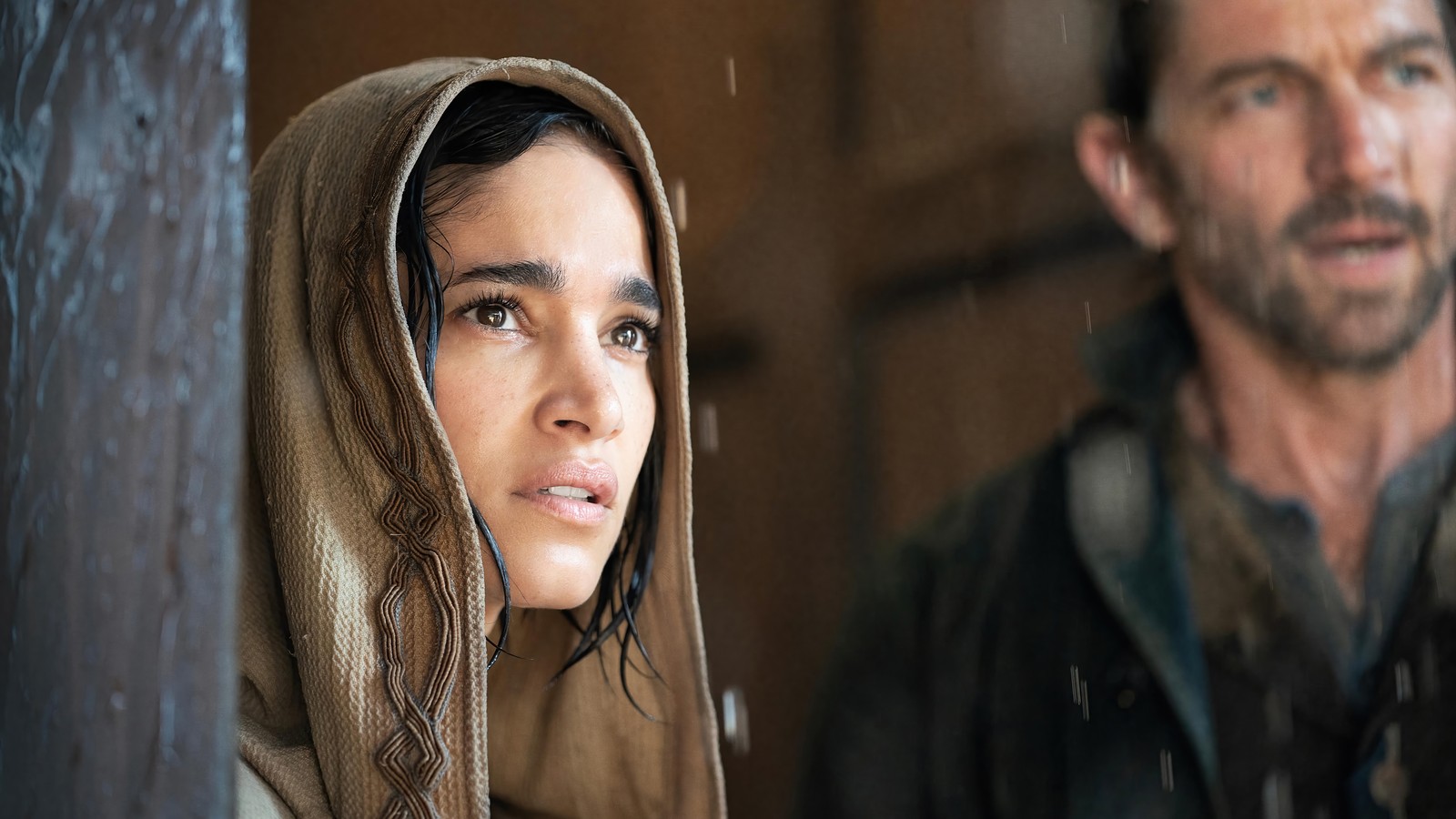 Arafed image of a woman in a hoodedie and a man in a jacket (rebel moon, movie, 2023, sofia boutella)