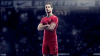 Cristiano Ronaldo in einem roten Portugal-Trikot, das Athletik und Stärke zeigt, vor einem dramatischen Sporthintergrund.