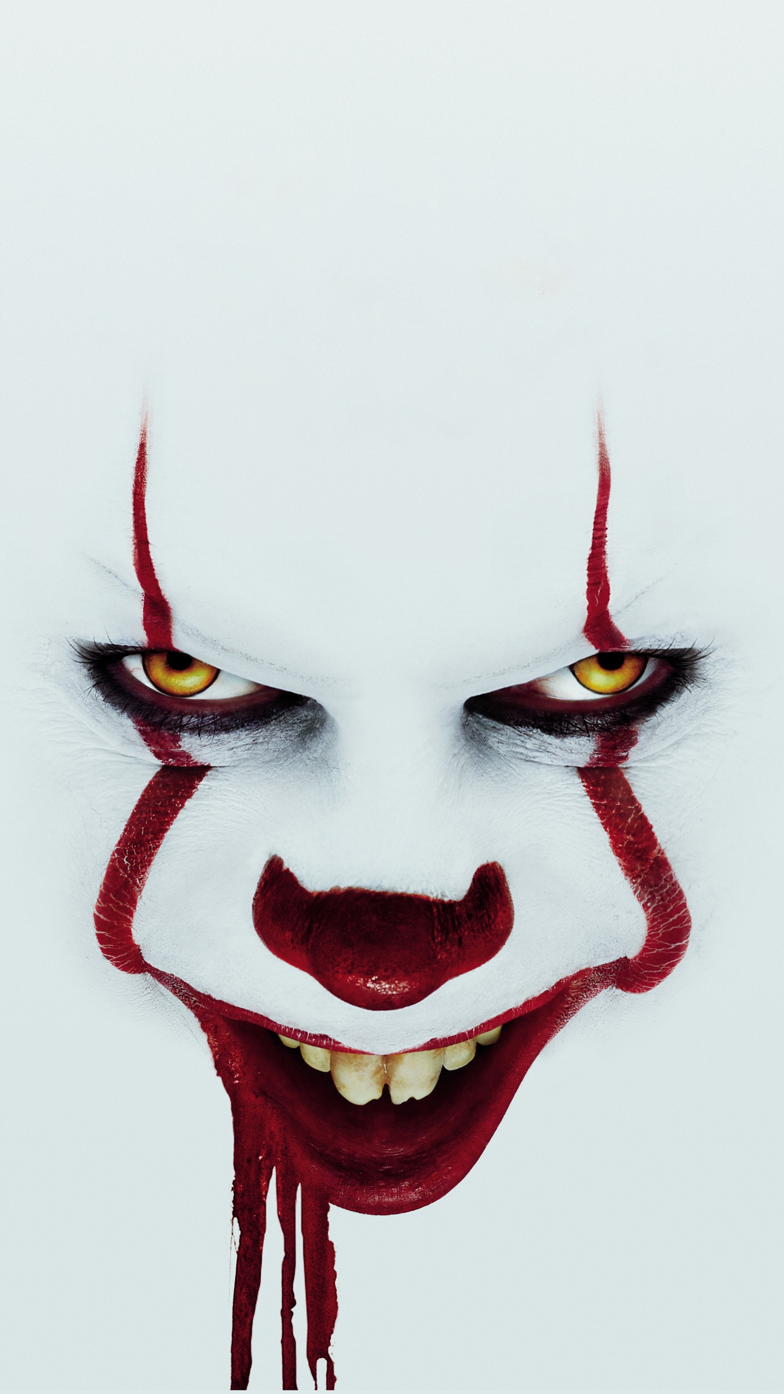 Un primer plano de la cara de un payaso con sangre goteando. (payaso, horror, it, it 2019, eso capítulo dos)