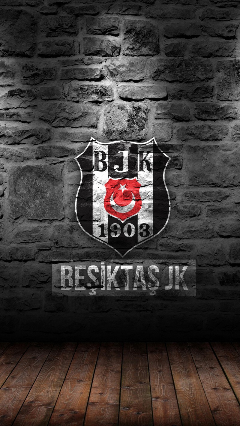 Близкий план кирпичной стены с деревянным полом (бешикташ, besiktas, bjk)