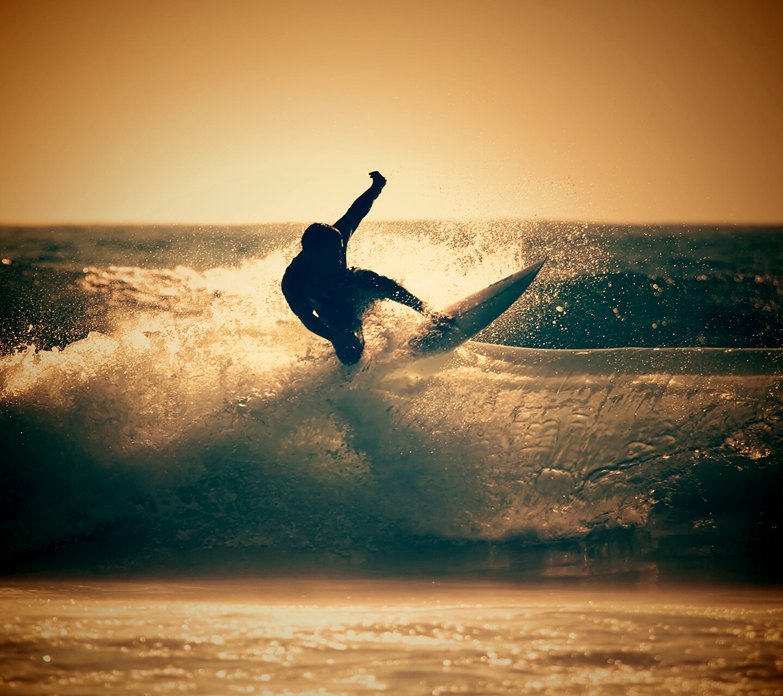 Surfer riding a wave in the ocean at sunset (galaxy nexus, galaxy s3, nexus, surf)