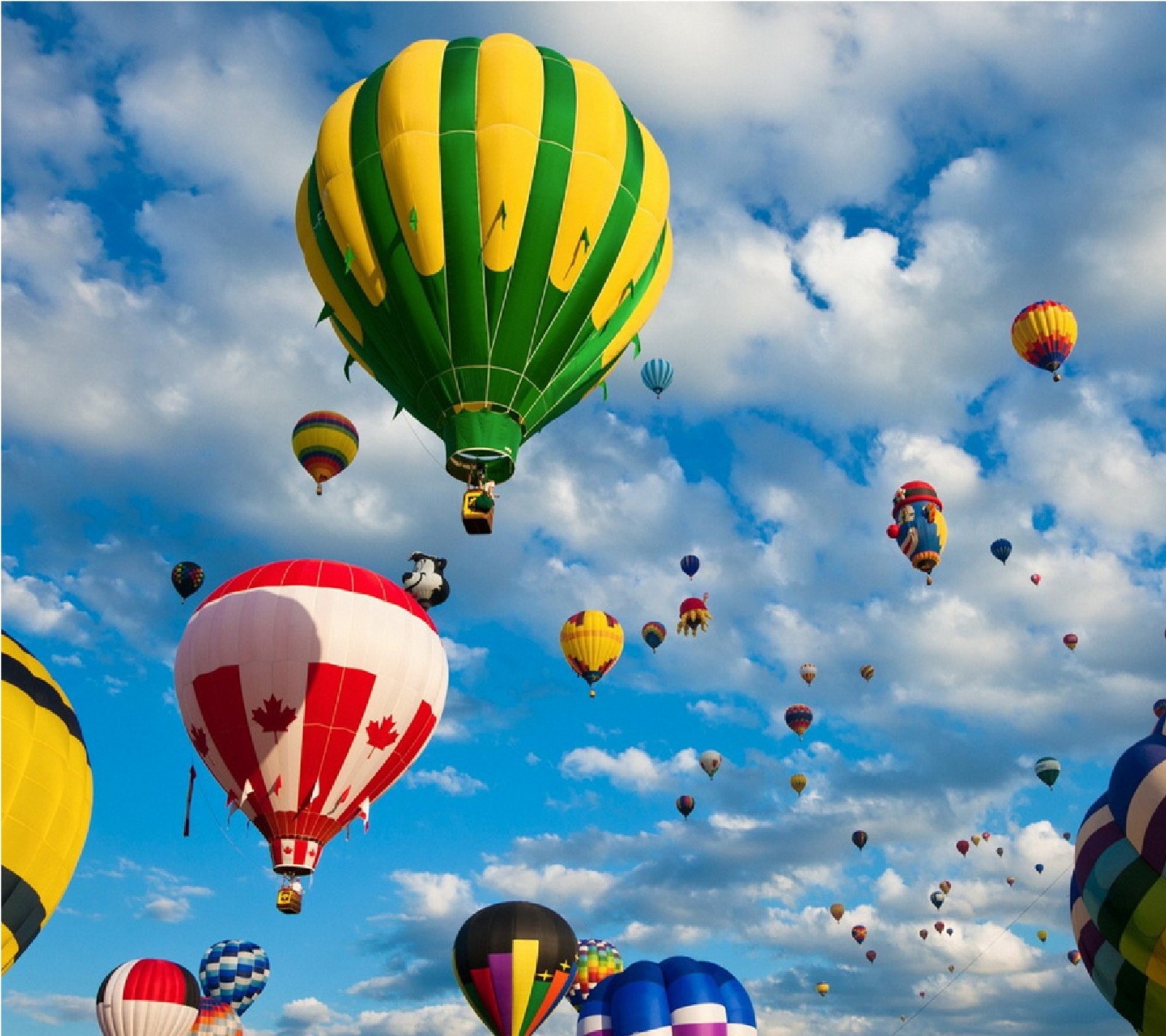 Arafly flying hot air balloons in the sky with a canadian flag (air, balloon, hd, walls)