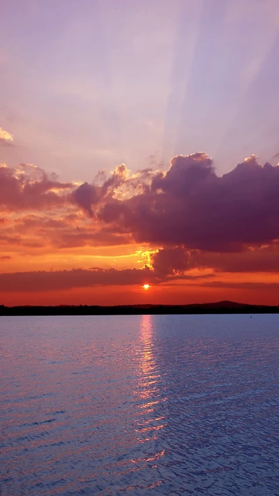 Tranquil Sunset Over Calm Waters