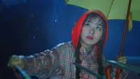 Seulgi Embraces the Rain at The Reve Festival: Umpah Umpah Vibes