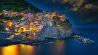 Manarola à l'heure bleue : Lumières nocturnes enchanteresses sur les Cinque Terre