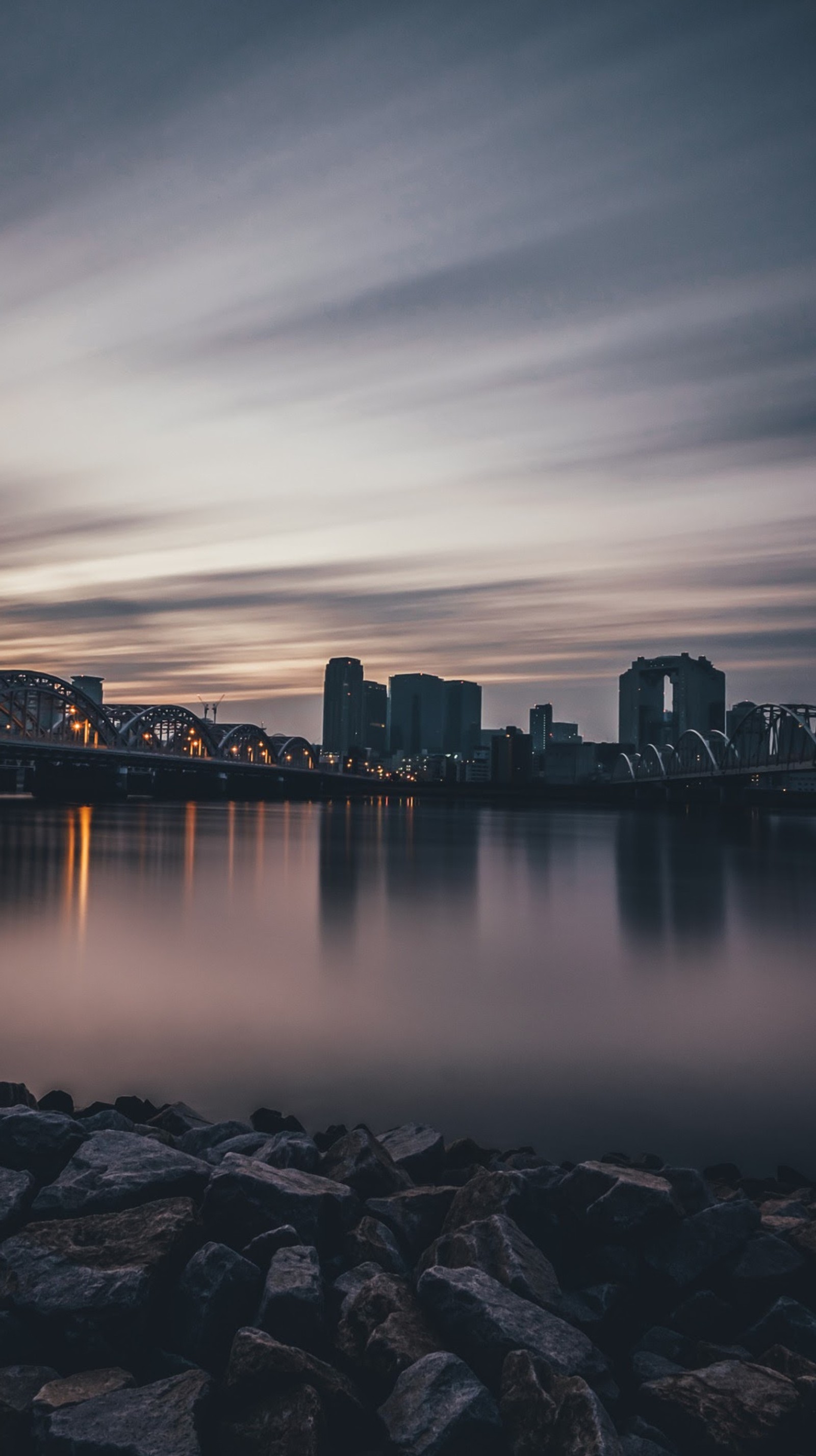 building, city, purple, rocks, sky Download Wallpaper