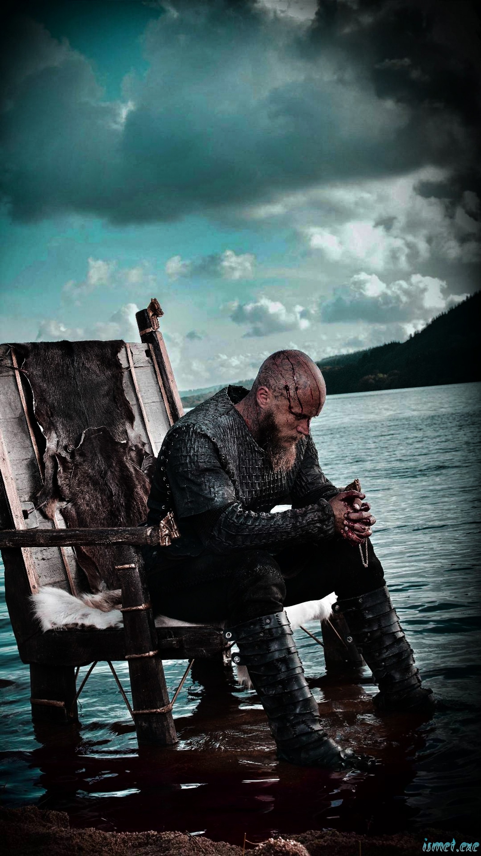 There is a man sitting on a wooden bench in the water (ragnar, lothbrok, awesome, cool, view)