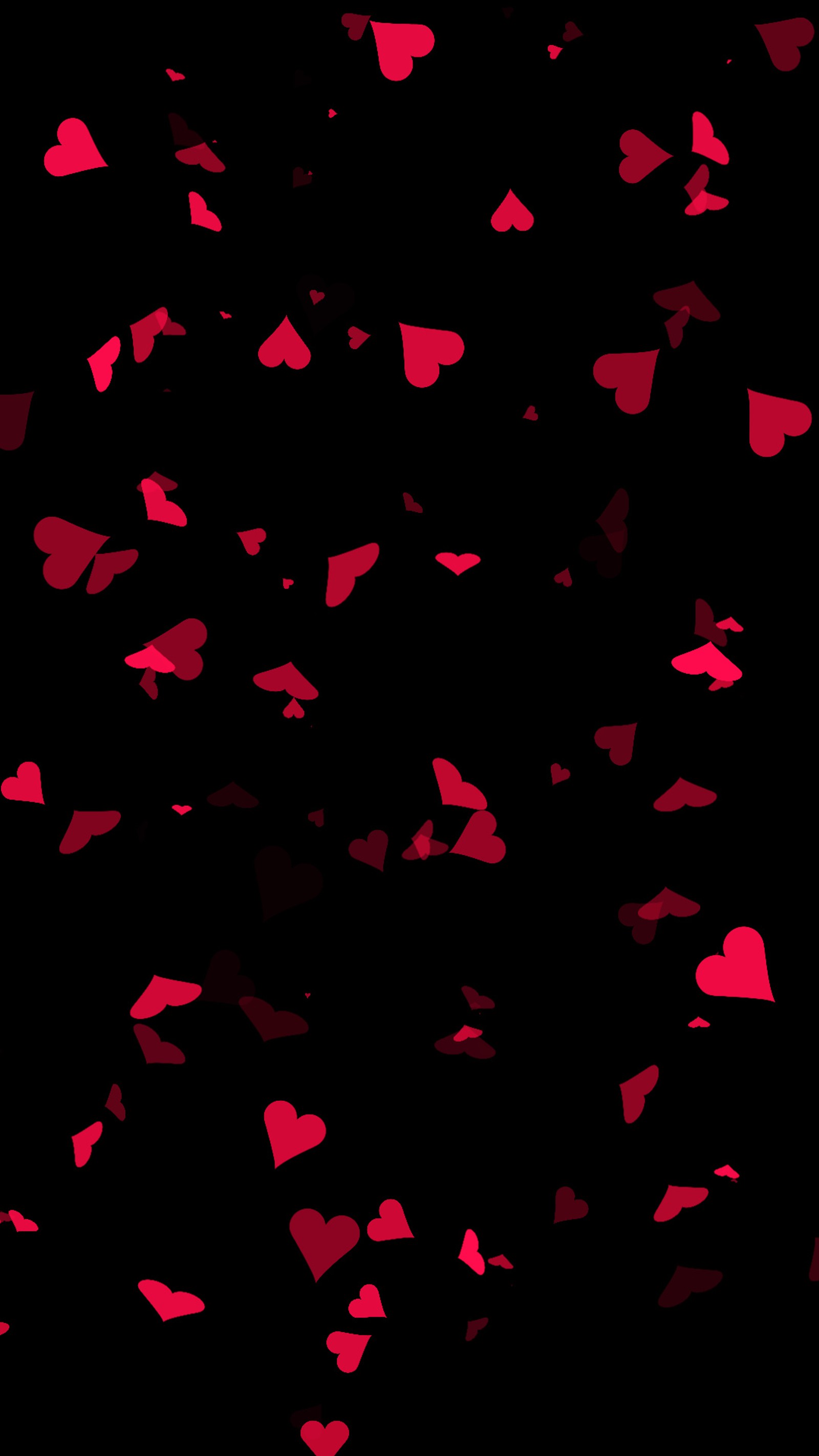 A close up of a bunch of hearts flying in the air (confetti, hearts, red)