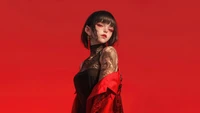 Elegant Anime Girl with Intricate Tattoos Against a Bold Red Background