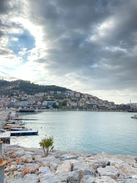 Serene Lakeview with Boats and Scenic Hillside