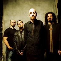 System of a Down: A Musical Ensemble Captured in Timeless Style