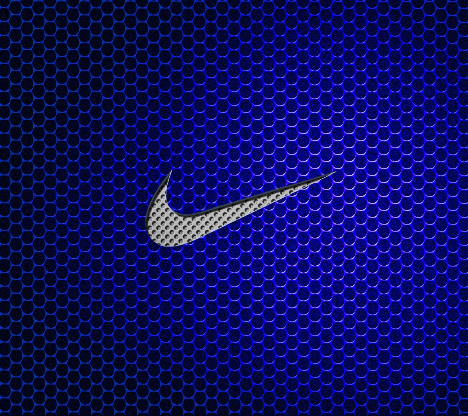 Un primer plano del logo de nike en un fondo de malla (hd, logotipo, nike)