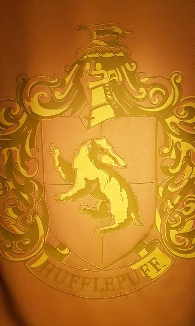 Blason de Hufflepuff : Maison de la Loyauté et du Travail Acharné