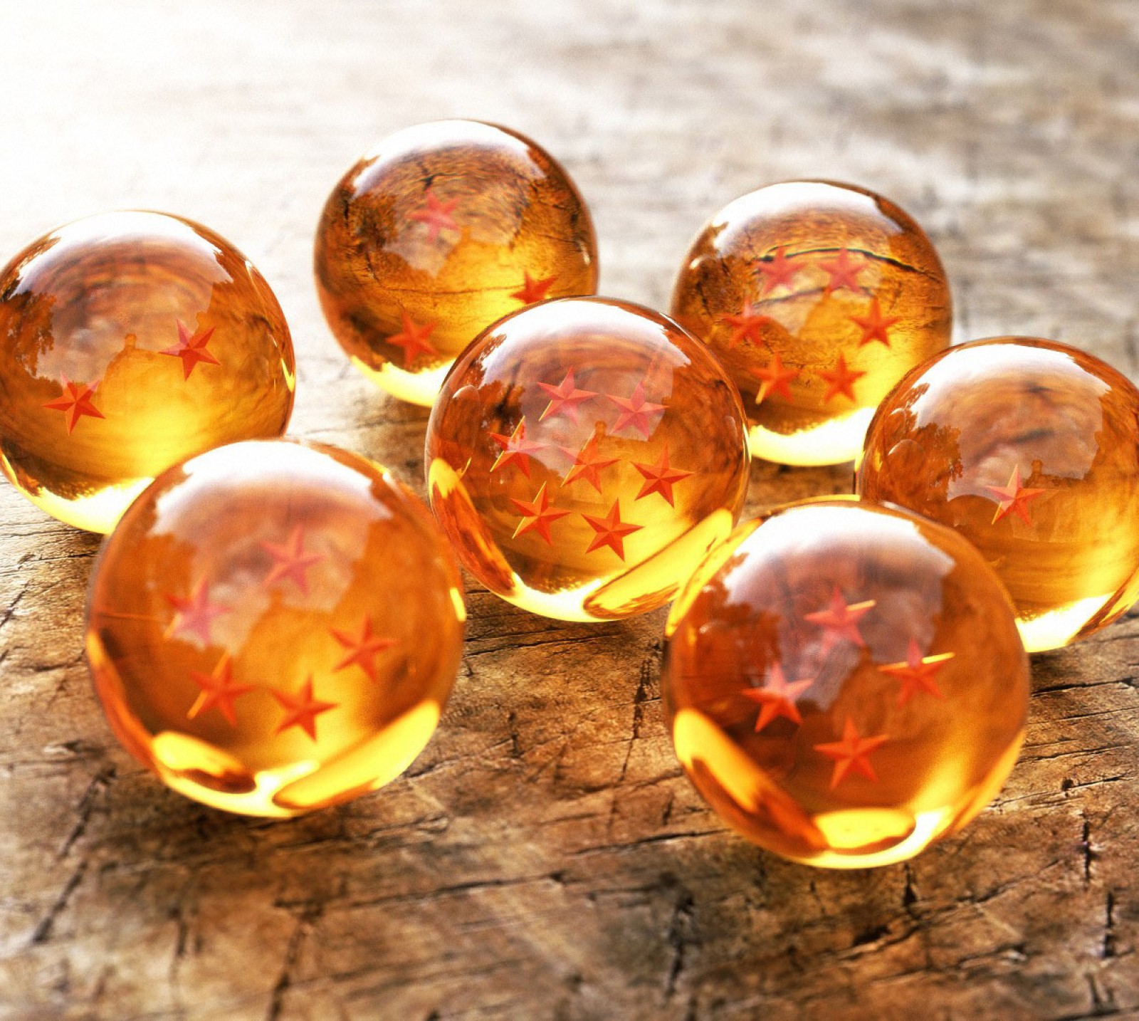 A close up of a bunch of glass balls with red stars on them (anime, ball, dbz)