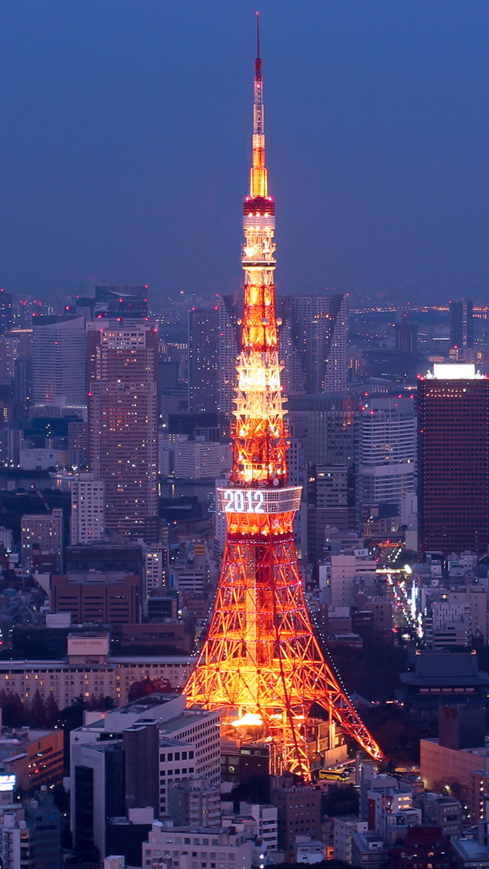 Arafed view of a city at night with a tall tower (eiffel, france, paris, tower)