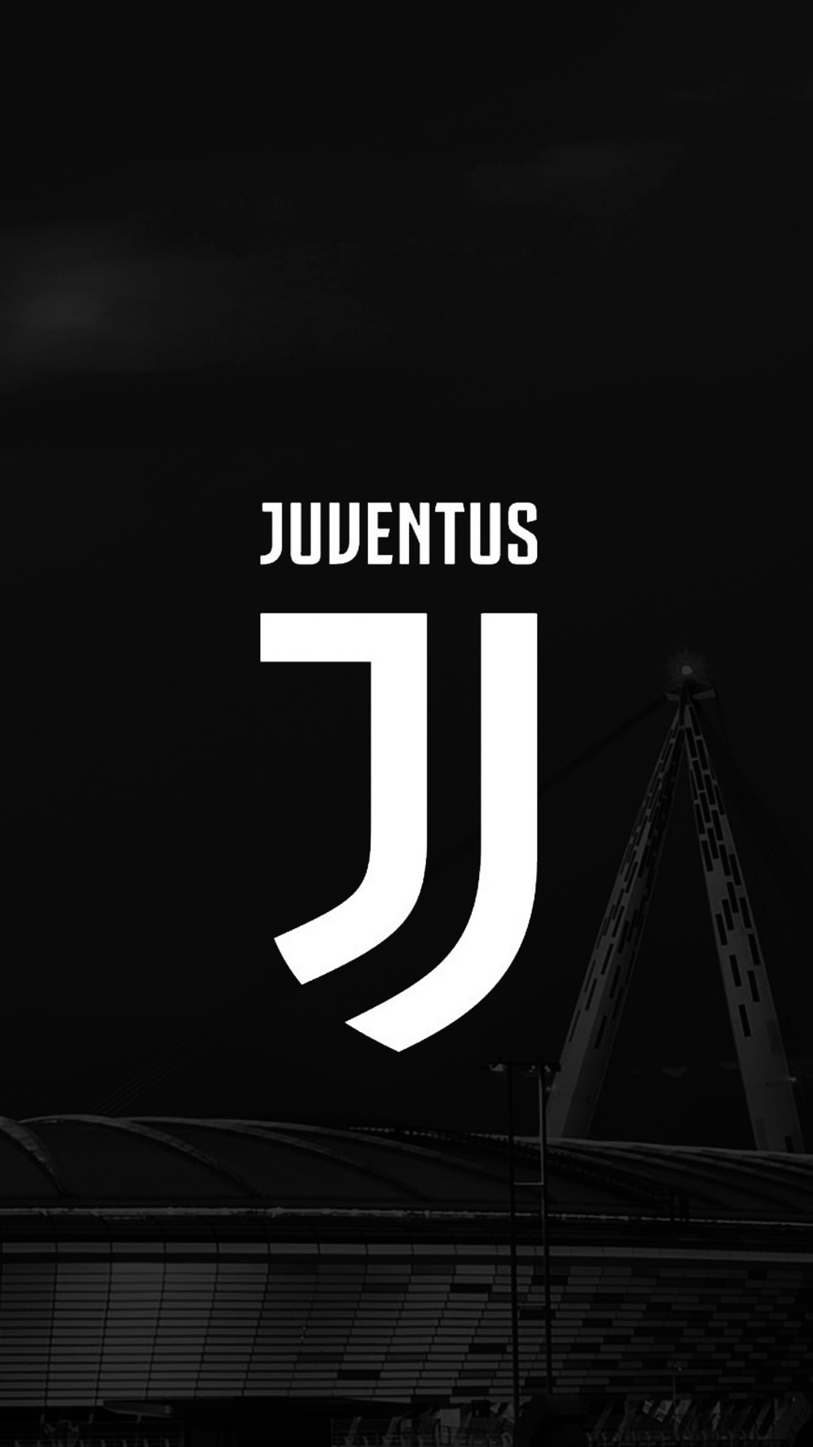 Una foto en blanco y negro de un estadio de fútbol con el logo de la juventus (juventus)