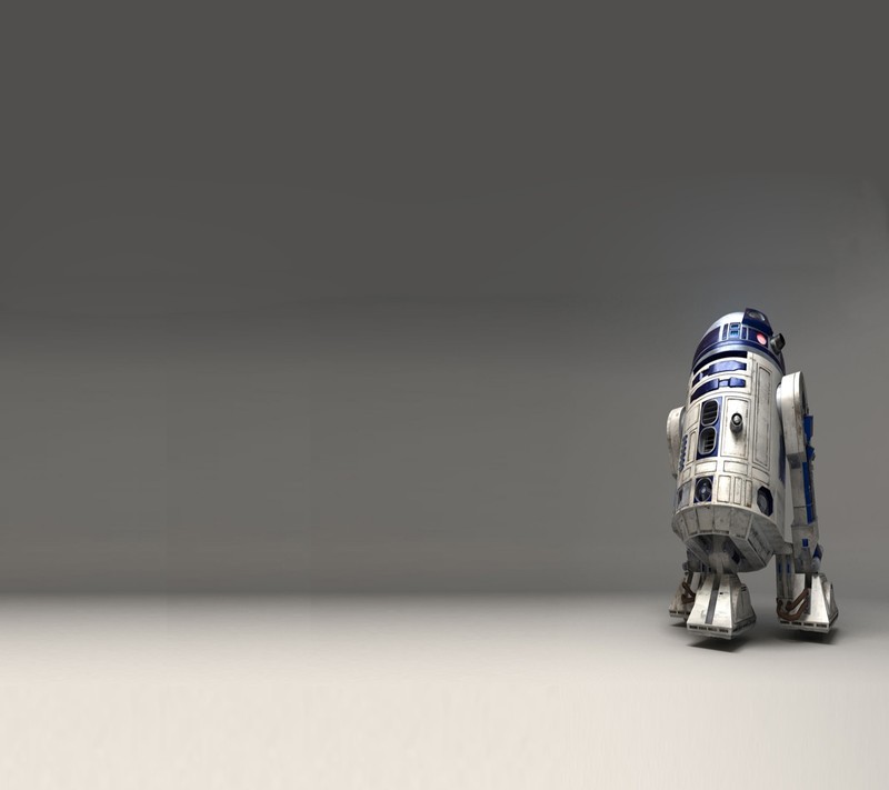 Близкий план игрушечного робота на белой поверхности (r2d2, звезда, войны)