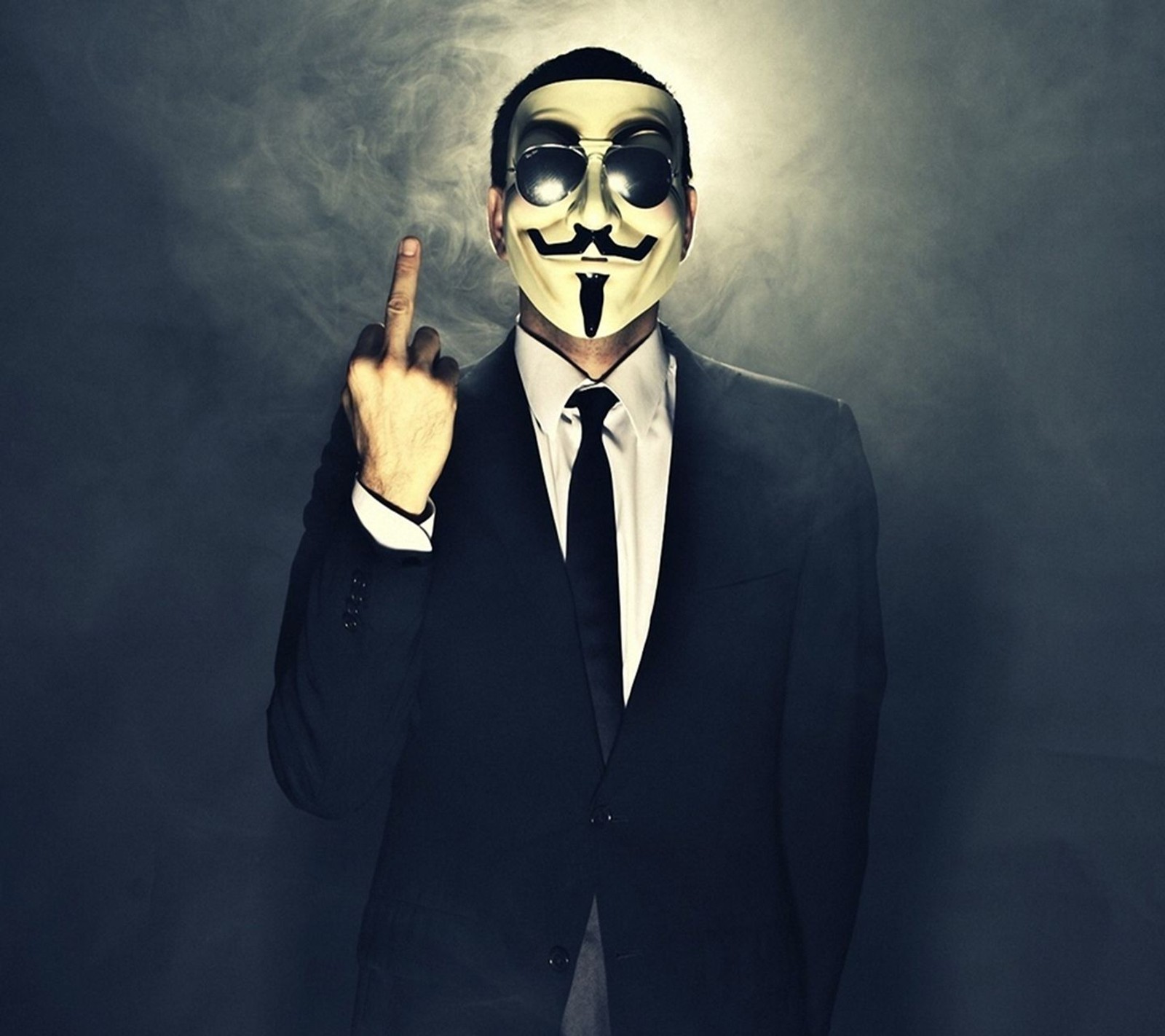 Arafed man in a suit and tie with a guy wearing a mask (anonymous, cool, finger, hide, man)