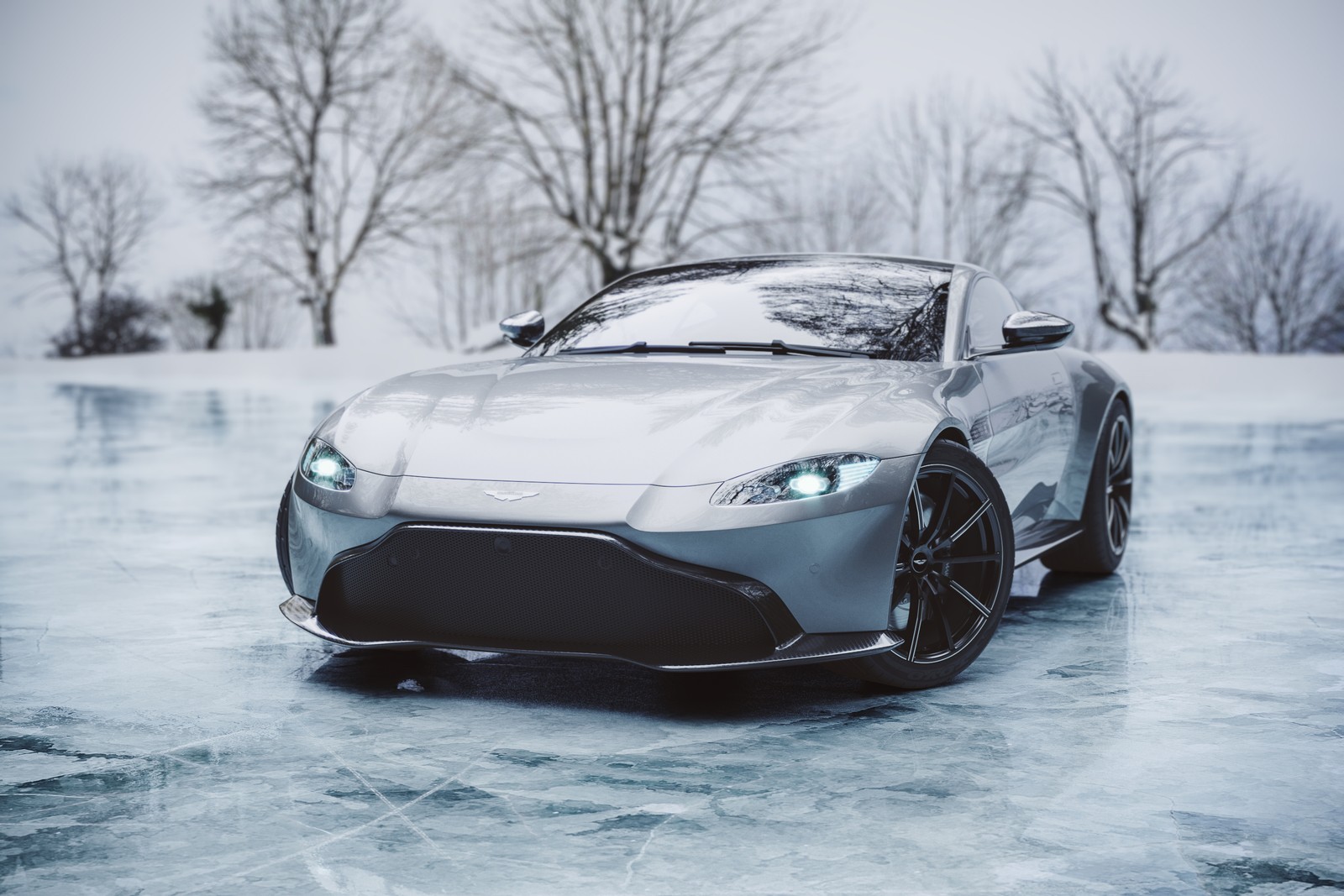 A close up of a car on a frozen surface with trees in the background (aston martin, sports car, car, aston martin vantage, snow)