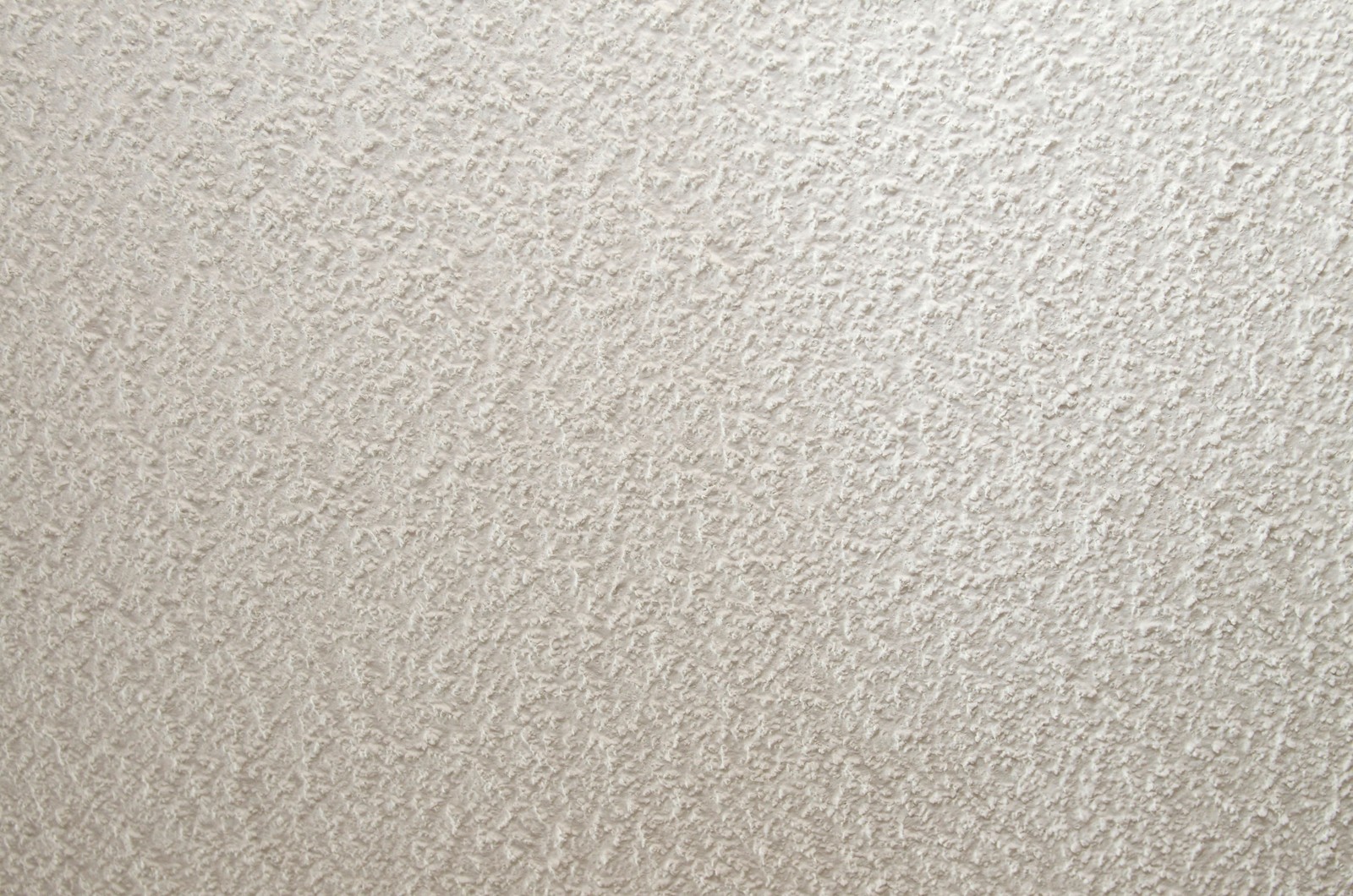 A close up of a white wall with a clock on it (material, grey, bedroom)