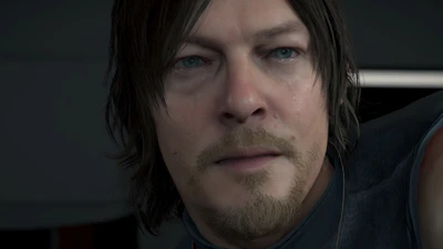 Eine Nahaufnahme eines Charakters aus "Death Stranding", mit realistischen Gesichtszügen und intensiven Ausdruck.