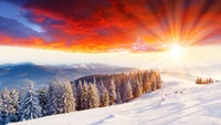 Vibrant Sunrise Over Snow-Capped Mountains