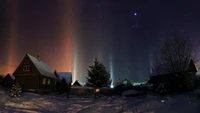 Cielo Nocturno Encantador: Fenómeno de Aurora sobre Paisaje Nevado