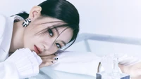 Chaeryeong of ITZY in a sleek, conceptual portrait showcasing elegance and style.