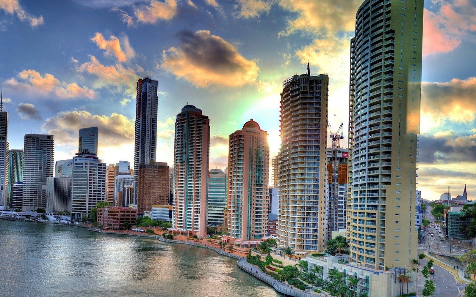 Una vista impresionante del horizonte de la ciudad con un río que fluye a través de él (brisbane, ciudad, paisaje urbano, rascacielos, área urbana)