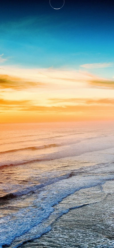 Serene Sunset Over Ocean Waves